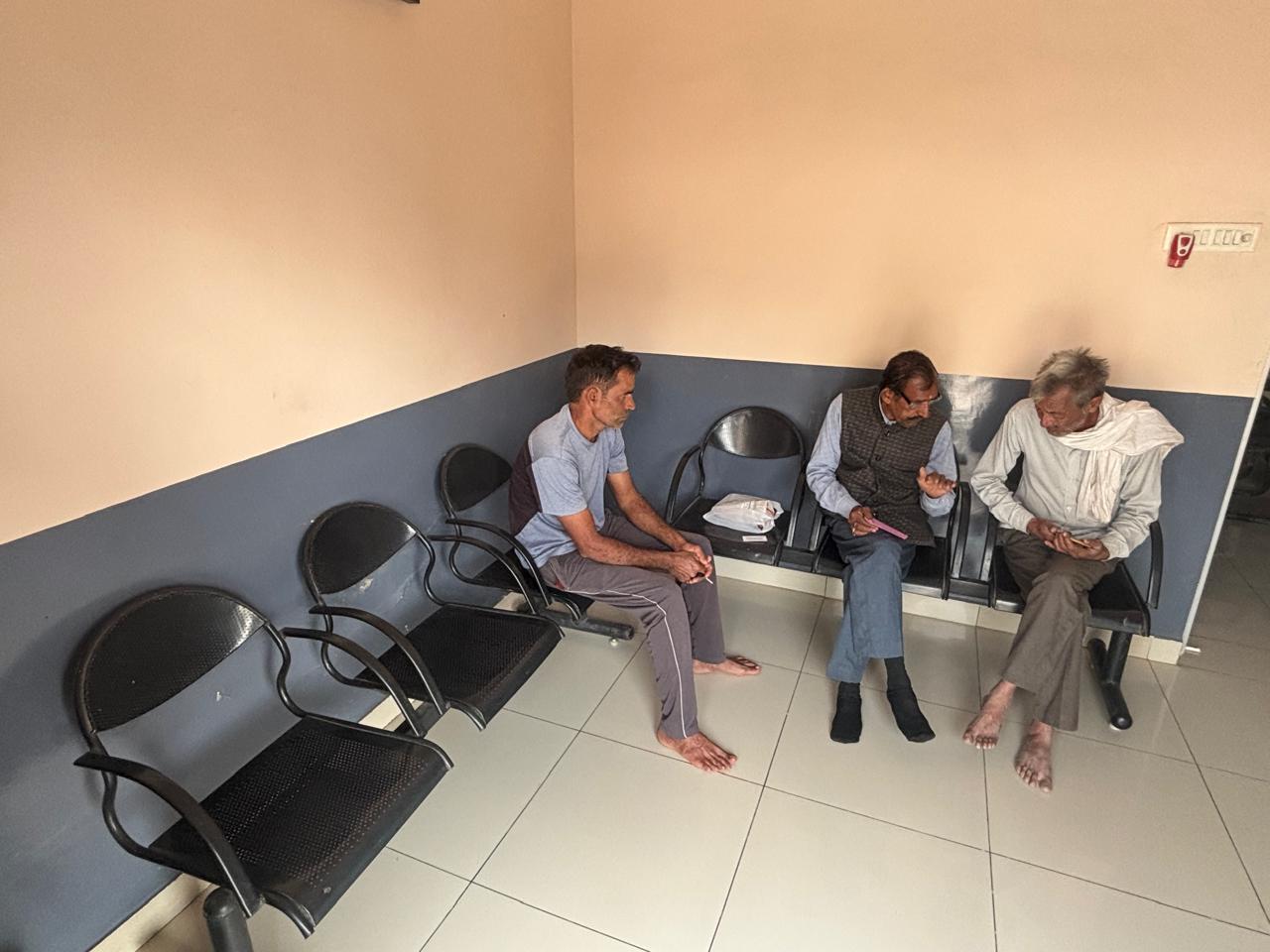 Patients seated in the clinic waiting area