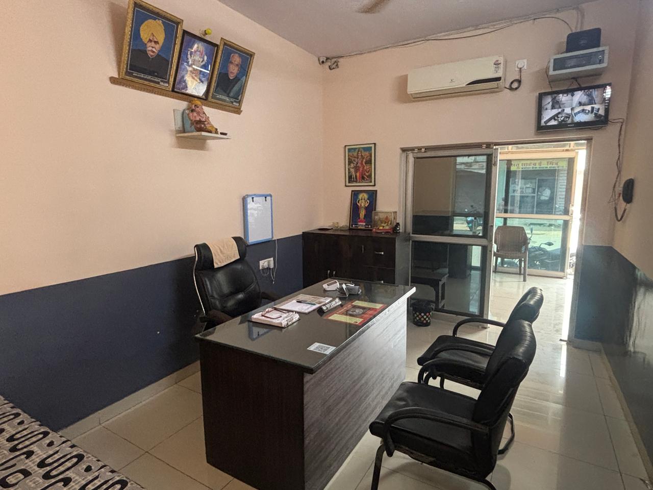 Doctor's room with CCTV, AC and devotional decor
